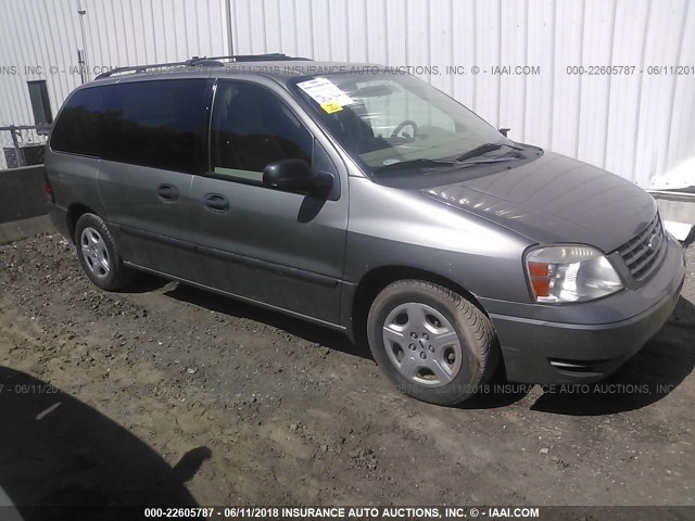 2FMZA51634BA91382 - 2004 FORD FREESTAR SE GREEN photo 1