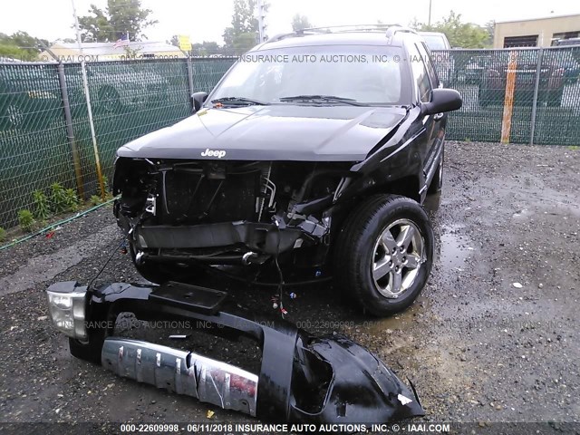 1J8GW68J04C159448 - 2004 JEEP GRAND CHEROKEE OVERLAND BLACK photo 6