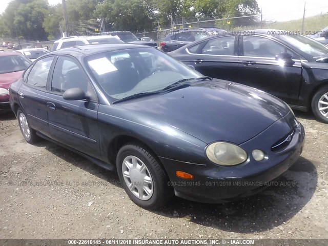 1FAFP52U3WA239120 - 1998 FORD TAURUS LX/SE GREEN photo 1