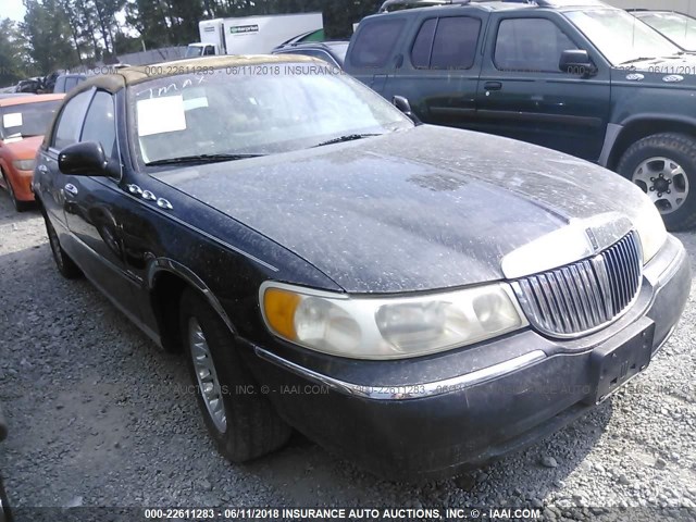 1LNHM83W5XY613342 - 1999 LINCOLN TOWN CAR CARTIER BLACK photo 1