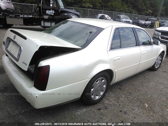 1G6KE57Y1YU237042 - 2000 CADILLAC DEVILLE DHS WHITE photo 4