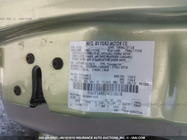1FAFP34NX7W310618 - 2007 FORD FOCUS ZX4/S/SE/SES GREEN photo 9