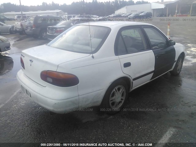 1Y1SK5281YZ414054 - 2000 CHEVROLET GEO PRIZM LSI WHITE photo 4