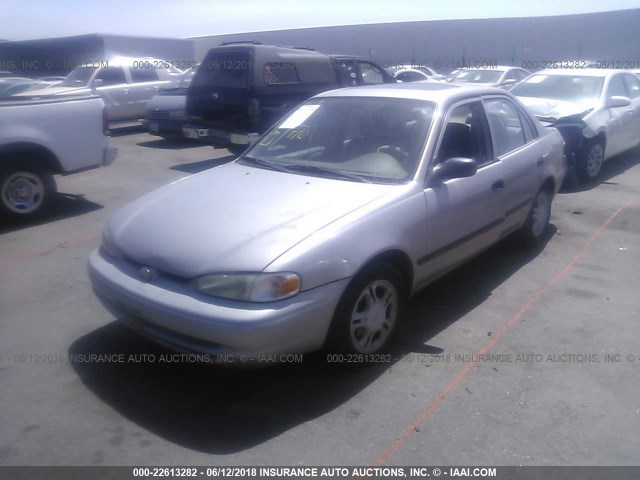 1Y1SK5486XZ444257 - 1999 CHEVROLET GEO PRIZM LSI SILVER photo 2