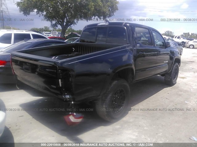 5TFCZ5AN4HX087656 - 2017 TOYOTA TACOMA DBL CAB/SR/TRDSPT/OR/PRO BLACK photo 4