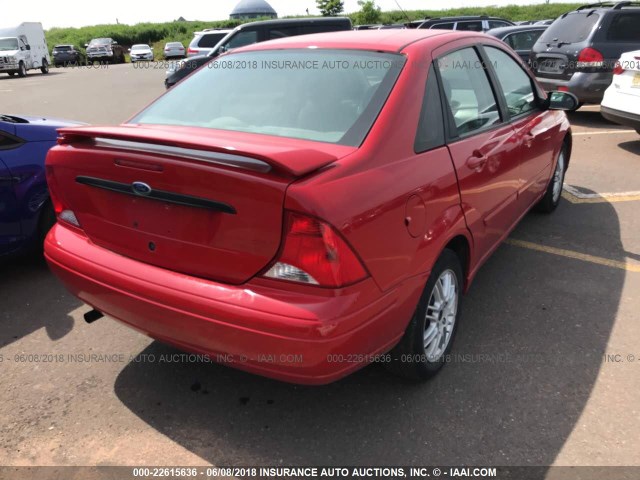 1FAFP3839YW176047 - 2000 FORD FOCUS ZTS RED photo 4