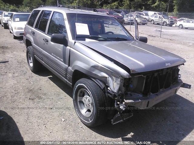 1J4FX58S9WC345439 - 1998 JEEP GRAND CHEROKEE LAREDO/TSI GRAY photo 1