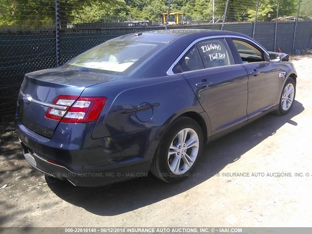 1FAHP2D87GG129550 - 2016 FORD TAURUS SE BLUE photo 4