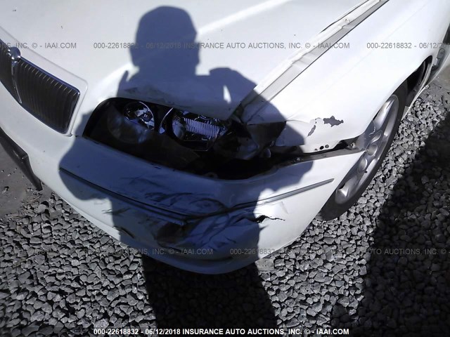 JNKBY31A3XM600748 - 1999 INFINITI Q45 T WHITE photo 6