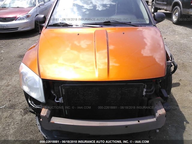 1B3CB3HA4BD257374 - 2011 DODGE CALIBER MAINSTREET ORANGE photo 6