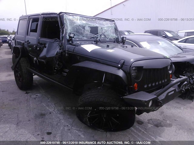 1J4BA3H10BL570242 - 2011 JEEP WRANGLER UNLIMITE SPORT BLACK photo 1