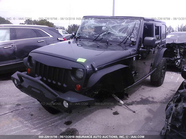 1J4BA3H10BL570242 - 2011 JEEP WRANGLER UNLIMITE SPORT BLACK photo 2