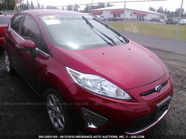 3FADP4FJ6BM143187 - 2011 FORD FIESTA SES RED photo 1