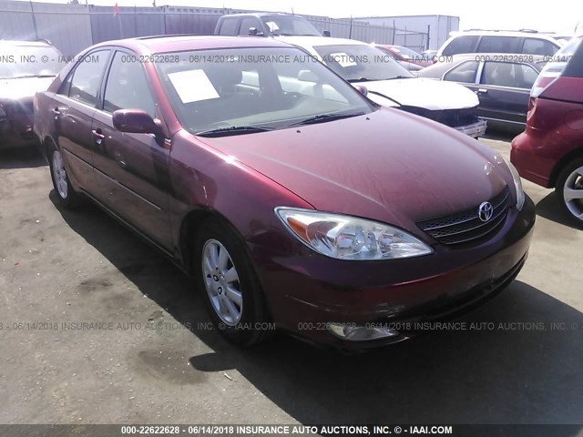JTDBE32K230171721 - 2003 TOYOTA CAMRY LE/XLE RED photo 1