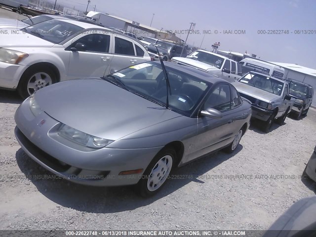 1G8ZY1278XZ232281 - 1999 SATURN SC2 SILVER photo 2