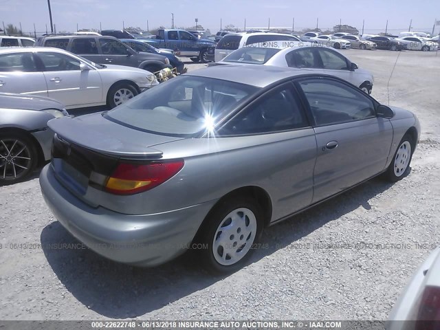 1G8ZY1278XZ232281 - 1999 SATURN SC2 SILVER photo 4