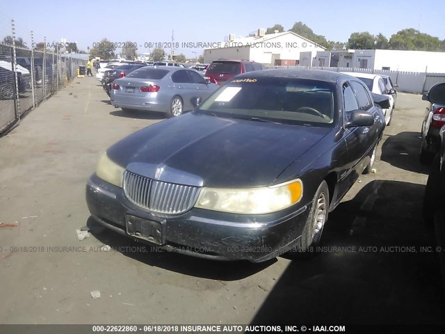 1LNHM81W1XY664890 - 1999 LINCOLN TOWN CAR EXECUTIVE GREEN photo 2