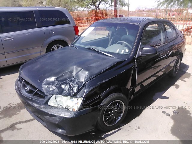 KMHCG35C21U094563 - 2001 HYUNDAI ACCENT GS BLACK photo 6