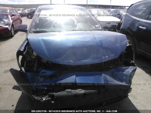 1FAHP36N39W243840 - 2009 FORD FOCUS SES BLUE photo 6