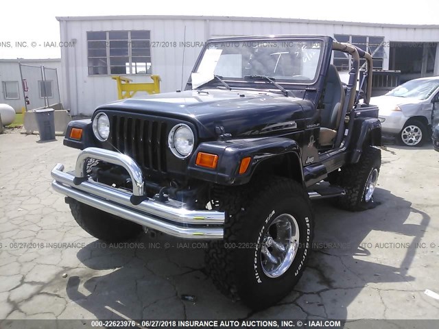 1J4FA59S22P713429 - 2002 JEEP WRANGLER / TJ SAHARA BLACK photo 2