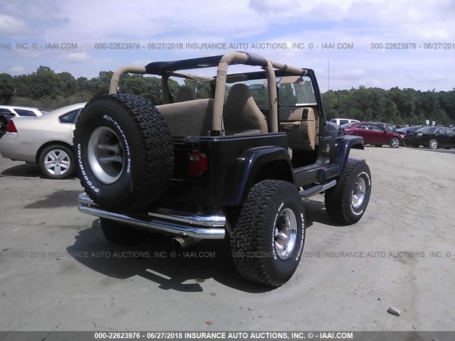 1J4FA59S22P713429 - 2002 JEEP WRANGLER / TJ SAHARA BLACK photo 4