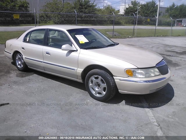 1LNHM97V7YY832912 - 2000 LINCOLN CONTINENTAL  Creme Foto 1