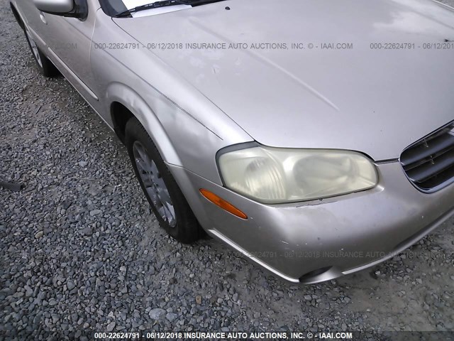 JN1CA31D9YT741113 - 2000 NISSAN MAXIMA GLE/GXE/SE GOLD photo 6