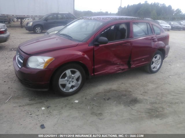 1B3HB48A99D143506 - 2009 DODGE CALIBER SXT RED photo 2