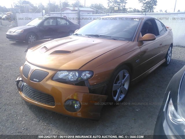 6G2VX12U46L559962 - 2006 PONTIAC GTO ORANGE photo 2