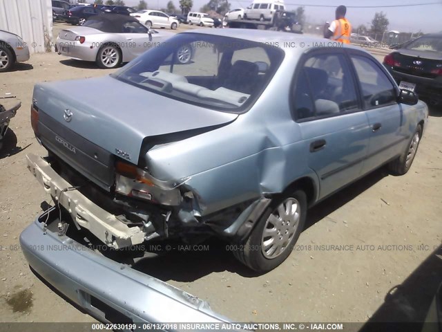 1NXAE09B7SZ335287 - 1995 TOYOTA COROLLA LE/DX ღია ლურჯი ფოტო 4