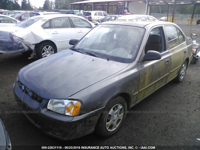 KMHCG45C11U160364 - 2001 HYUNDAI ACCENT GL GRAY photo 6