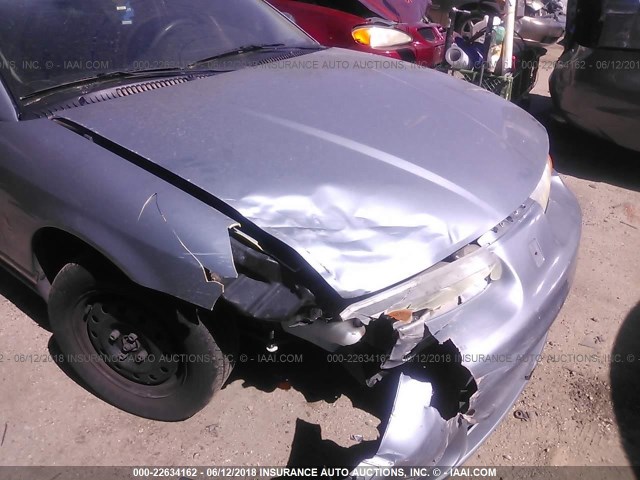 1G8ZH52852Z258412 - 2002 SATURN SL1 SILVER photo 6