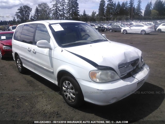 KNDUP131046565455 - 2004 KIA SEDONA EX/LX WHITE photo 1