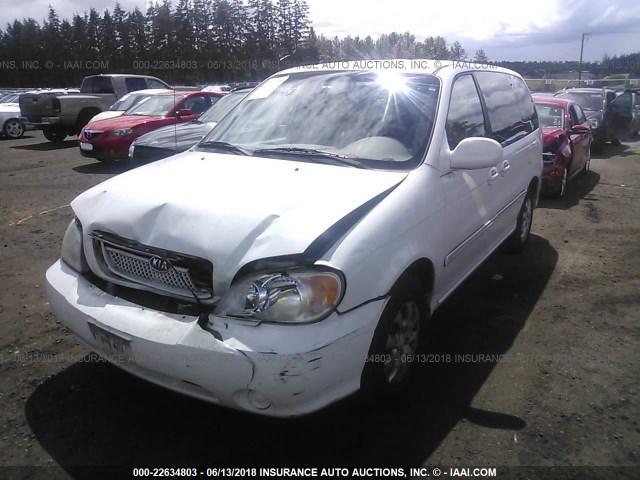 KNDUP131046565455 - 2004 KIA SEDONA EX/LX WHITE photo 2