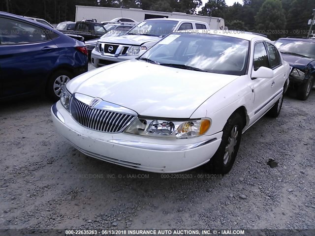 1LNHM97VX1Y663104 - 2001 LINCOLN CONTINENTAL  WHITE photo 2