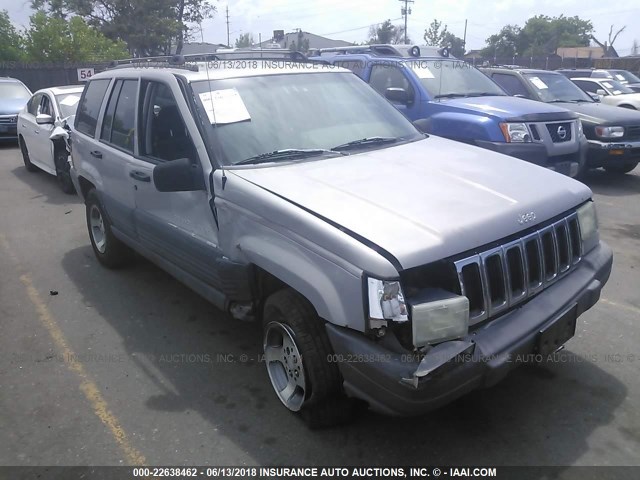 1J4GZ58S1VC749980 - 1997 JEEP GRAND CHEROKEE LAREDO/TSI SILVER photo 1