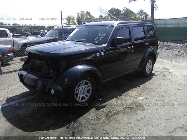 1D4PT2GK5BW599053 - 2011 DODGE NITRO SE BLACK photo 2