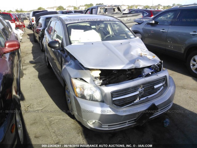 1B3CB3HA3BD163244 - 2011 DODGE CALIBER MAINSTREET SILVER photo 1