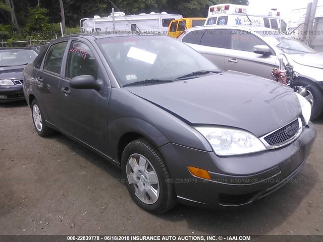 1FAHP34N77W210923 - 2007 FORD FOCUS ZX4/S/SE/SES GRAY photo 1