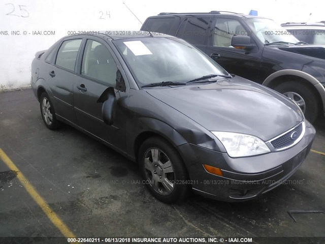 1FAHP34N27W224325 - 2007 FORD FOCUS ZX4/S/SE/SES GRAY photo 1