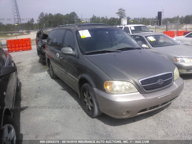 KNDUP131646512789 - 2004 KIA SEDONA EX/LX GRAY photo 1