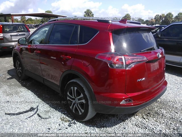 2T3ZFREV9GW262202 - 2016 TOYOTA RAV4 LE RED photo 3