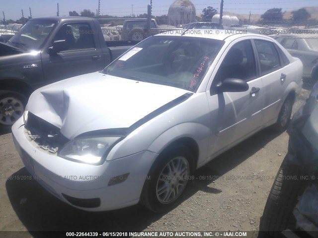 1FAFP34NX7W321487 - 2007 FORD FOCUS ZX4/S/SE/SES WHITE photo 2