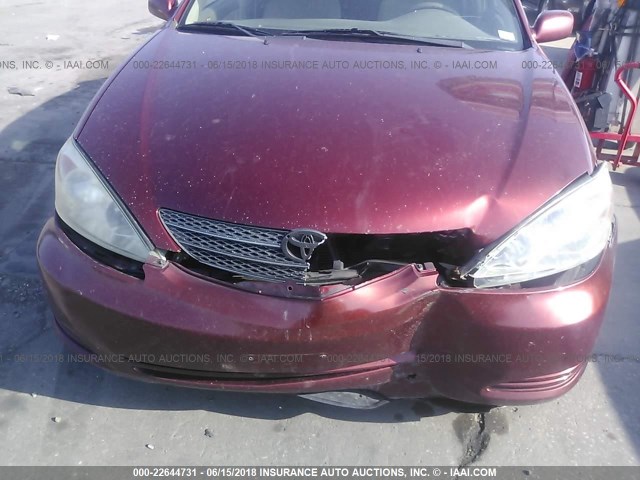 4T1BE32KX4U340244 - 2004 TOYOTA CAMRY LE/XLE/SE მუქწითელი ფოტო 6