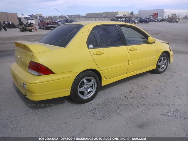 JA3AJ86EX3U048698 - 2003 MITSUBISHI LANCER OZ RALLY YELLOW photo 4