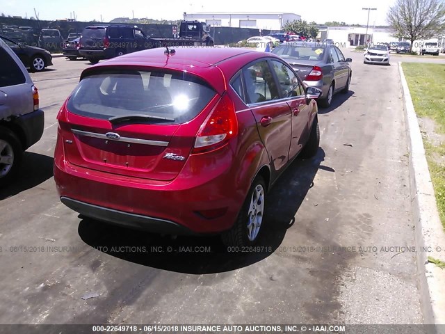 3FADP4FJ9BM121197 - 2011 FORD FIESTA SES RED photo 4