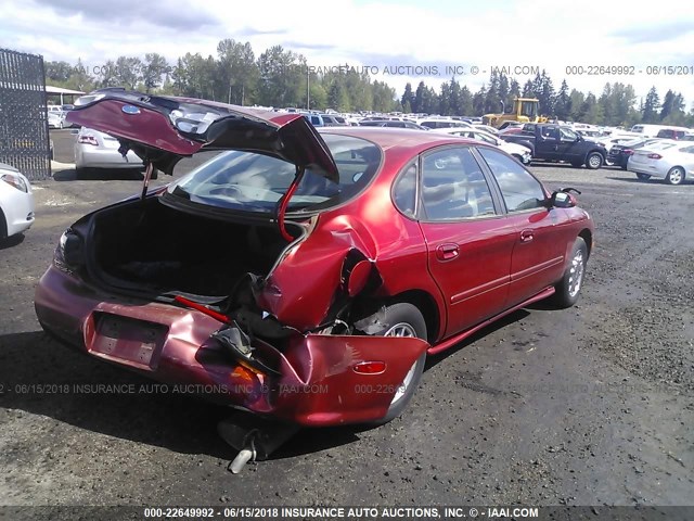 1FALP53S5VG148068 - 1997 FORD TAURUS LX RED photo 4