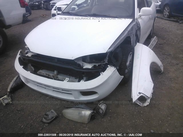 JA3AY31C32U056404 - 2002 MITSUBISHI MIRAGE LS WHITE photo 6