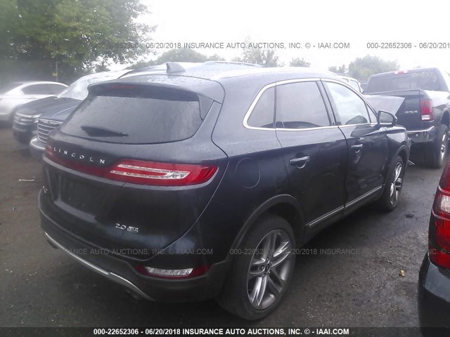 5LMCJ2A97FUJ18771 - 2015 LINCOLN MKC BLACK photo 4