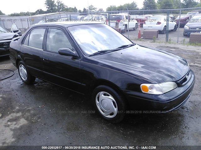 2T1BR12E3XC238860 - 1999 TOYOTA COROLLA VE/CE/LE BLACK photo 1